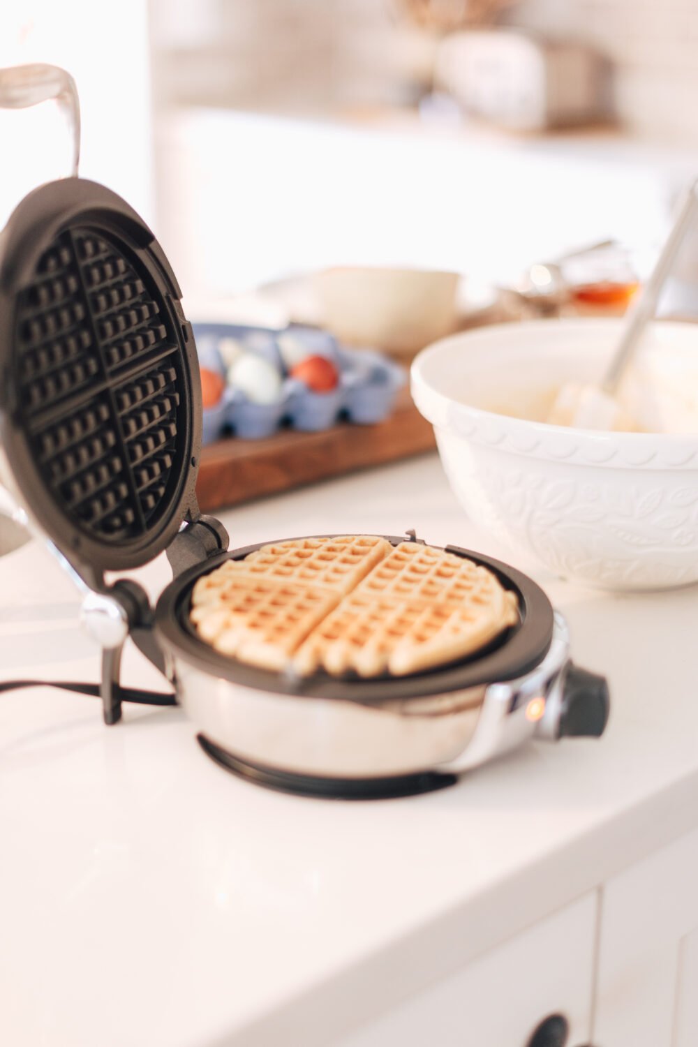 All Clad Waffle Maker Waffle maker with waffle in it