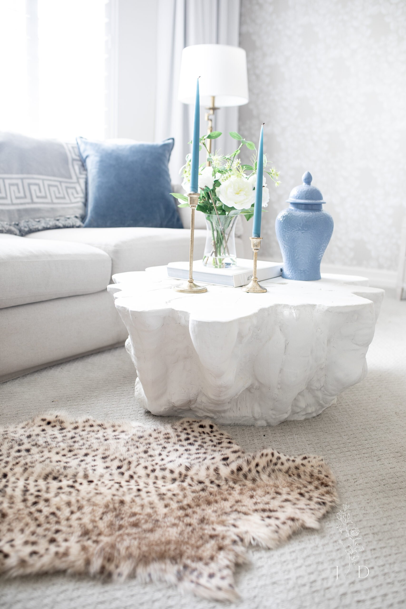 Serena and Lily Coffee table in all white. This is an indoor outdoor table.