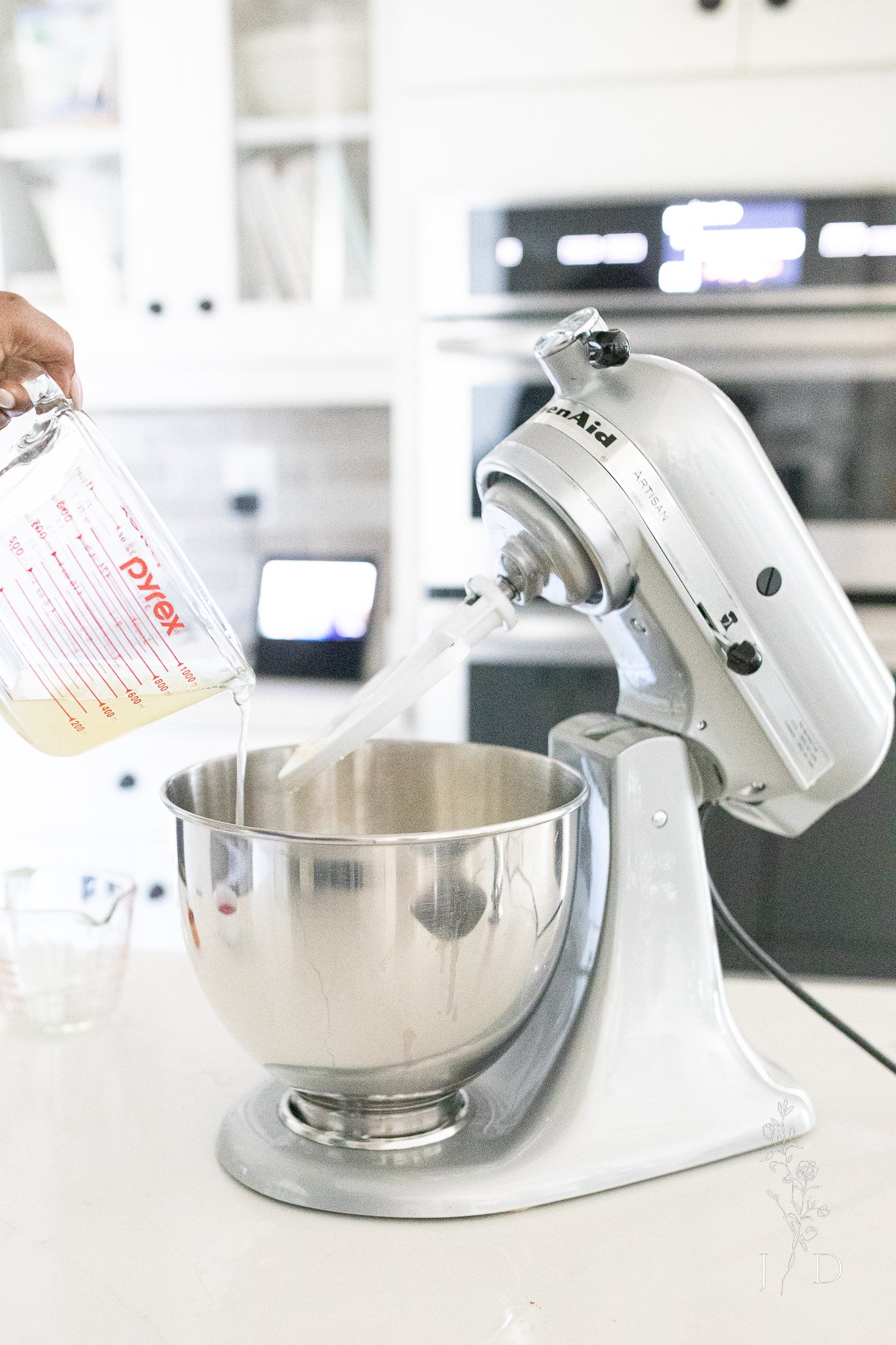 Pineapple juice going into cake mix.